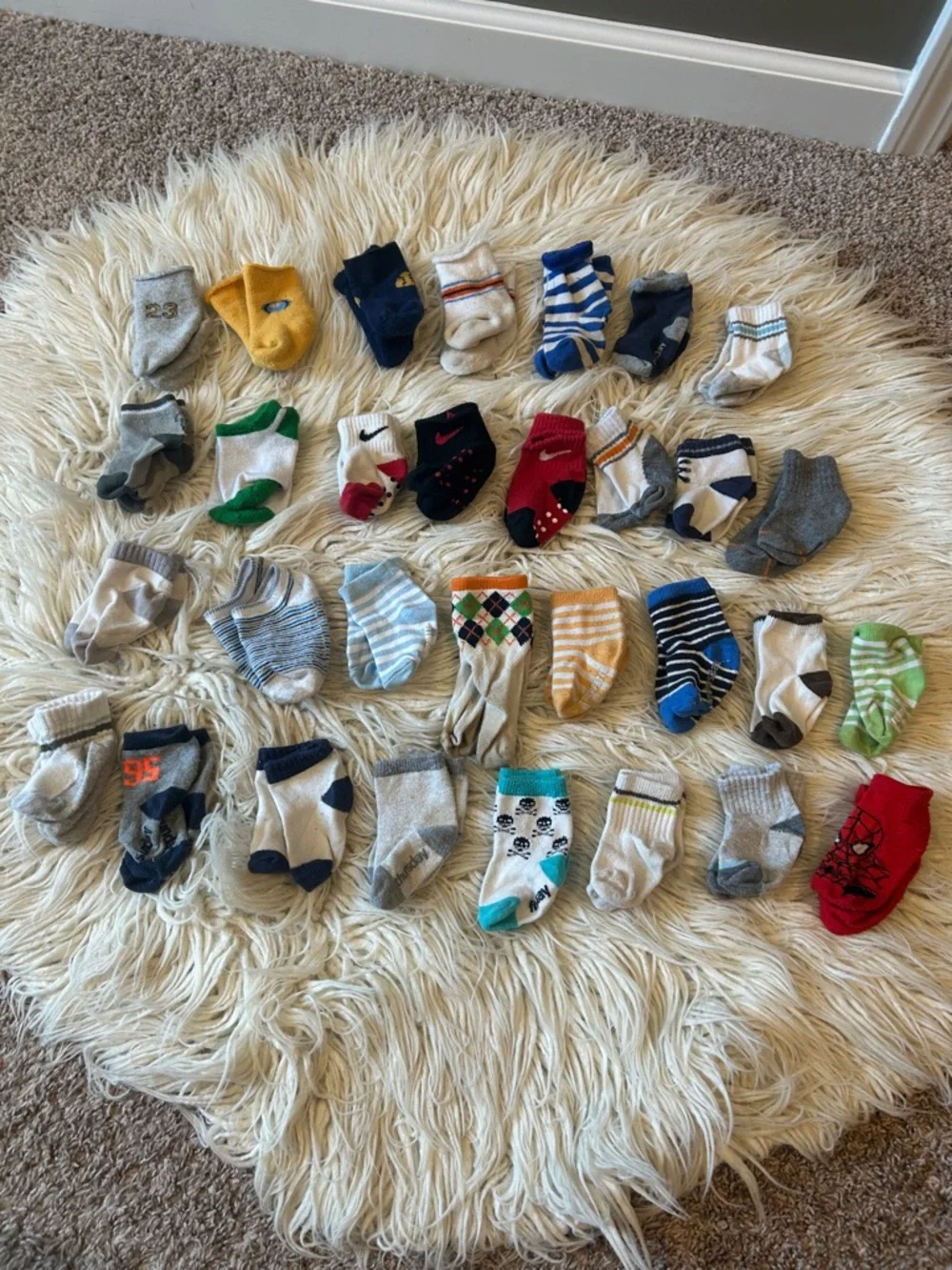 Baby sock lot of diff size med to 12 month-ish Assortment - 31 pairs